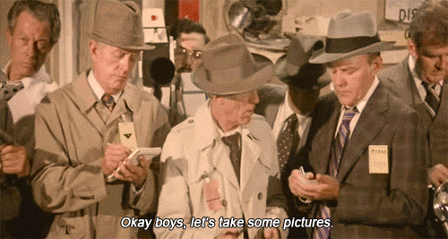 Men Taking Pictures